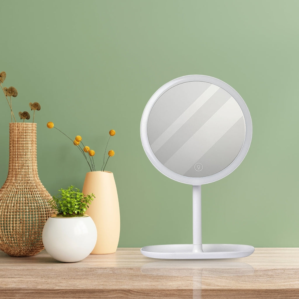 Two white round smart LED makeup vanity mirrors with adjustable tricolor lights on a bedroom table — view 5