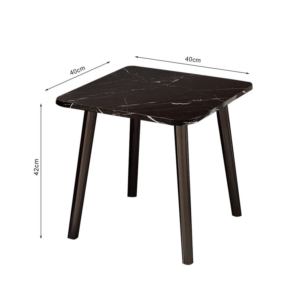 Black stone-patterned side table with sleek pine wood legs in a modern minimalist living room. — view 5