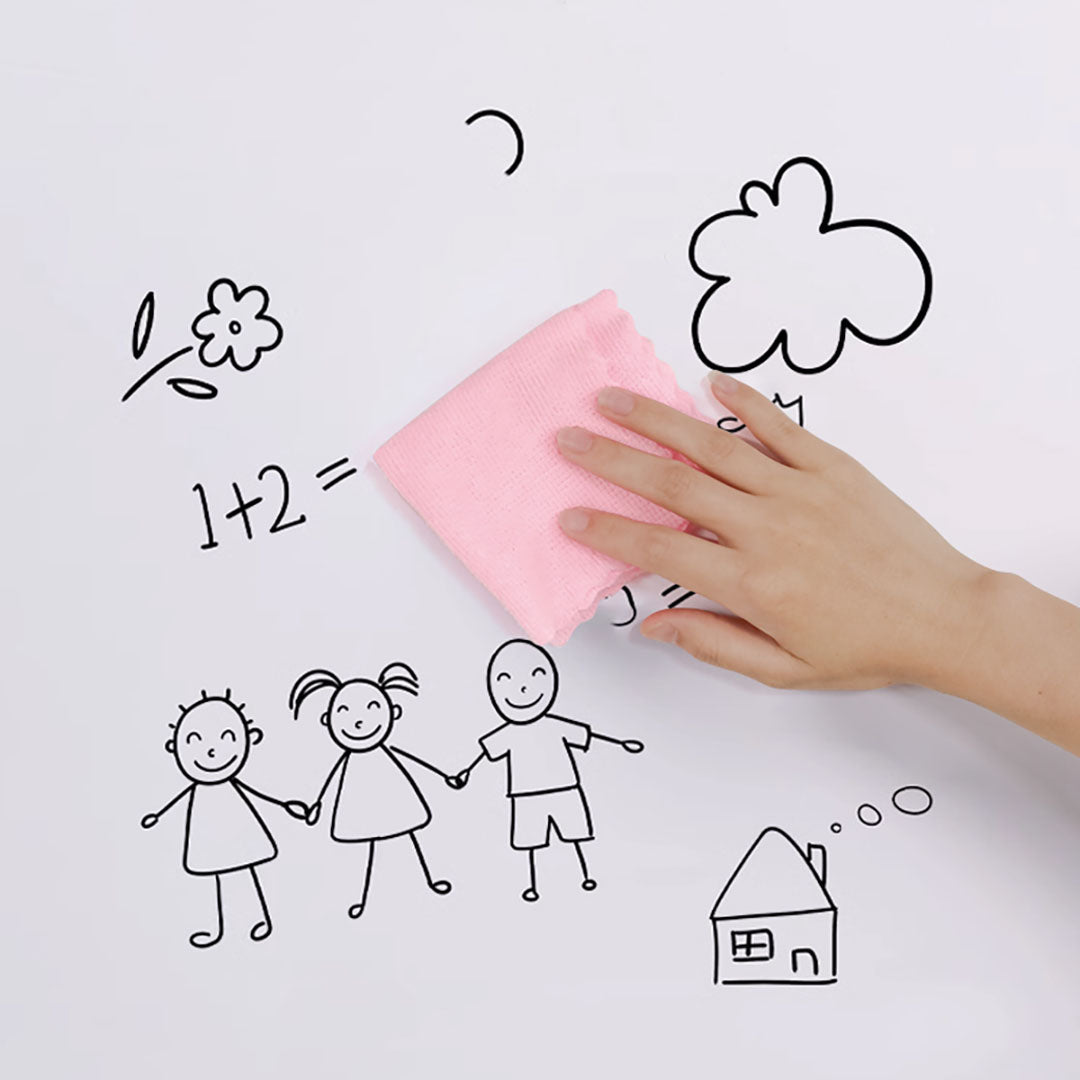 Clear transparent dry erase whiteboard wall sticker roll being applied to a modern office wall — view 5