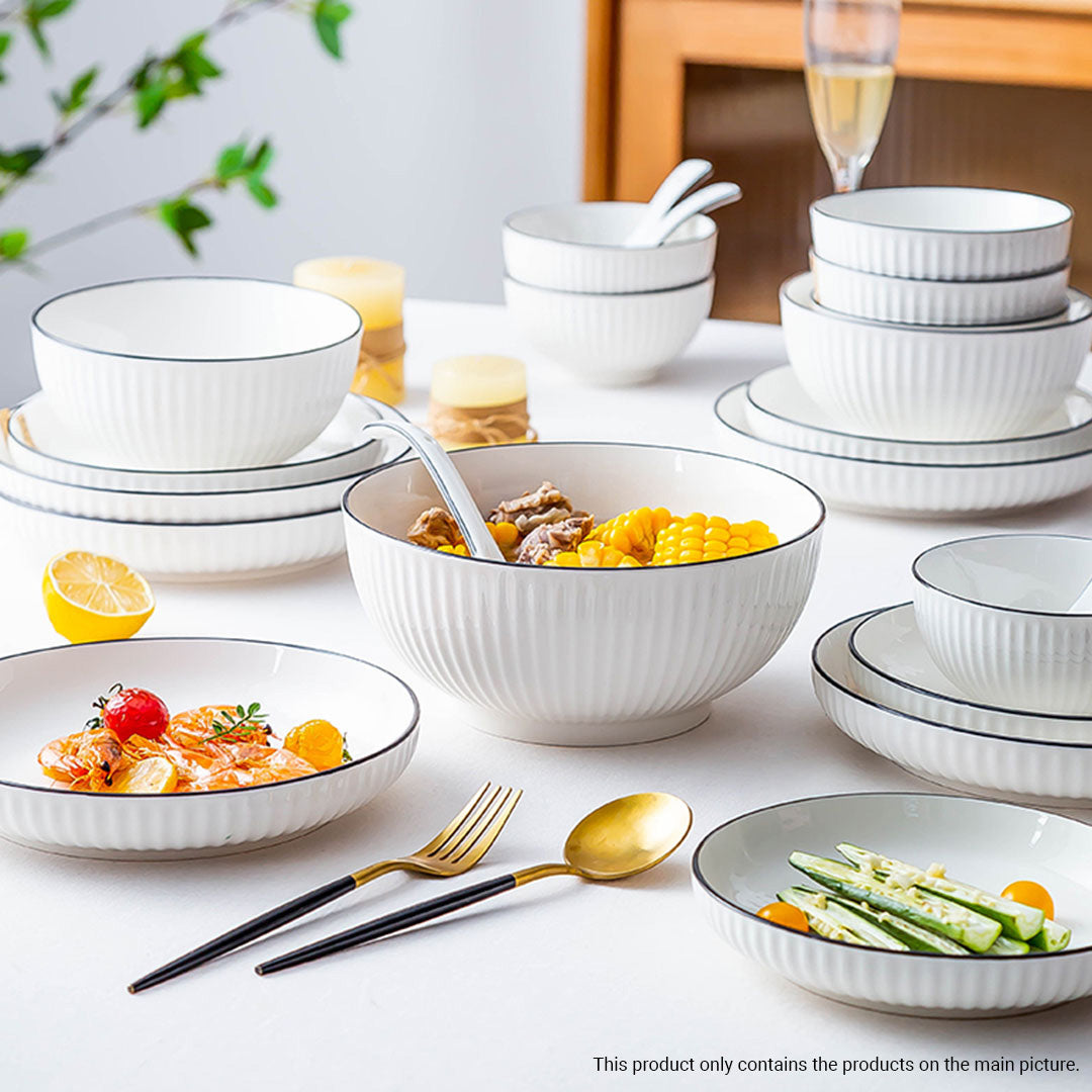 White minimalist ceramic dinnerware set including soup bowls, plates, spoons, and chopsticks — view 4