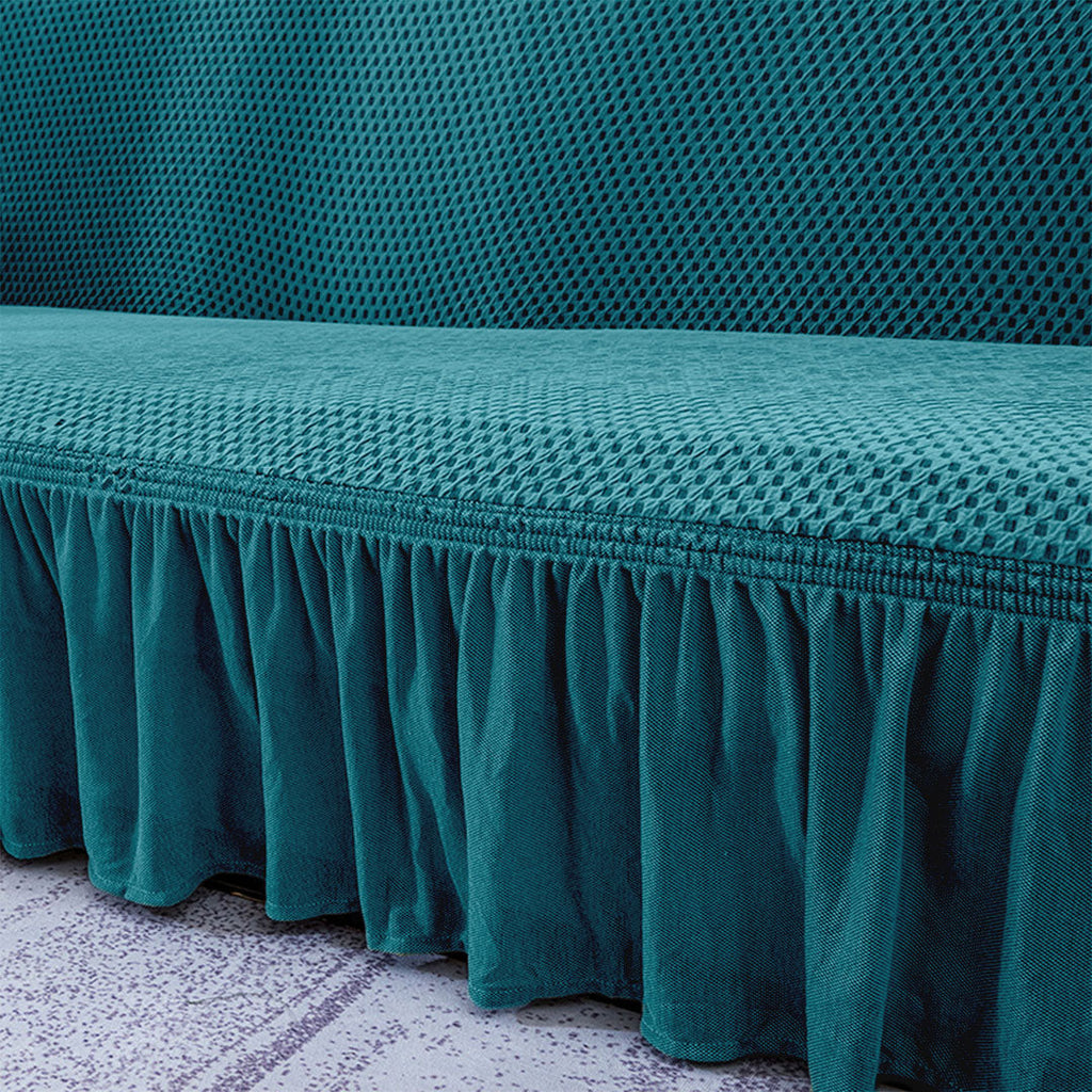 Blue high-stretch 2-seater sofa cover with elegant ruffled skirt protecting a living room couch — view 5