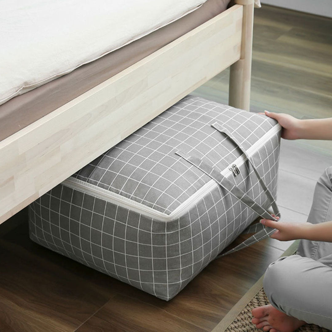 Two medium grey plaid foldable storage luggage bags with double zippers and cross-stitched handles — view 5