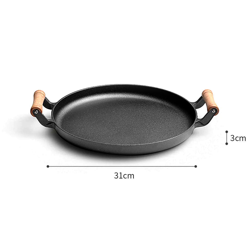 Round 31cm cast iron sizzle skillet with ribbed interior and wooden handle for searing steaks — view 5