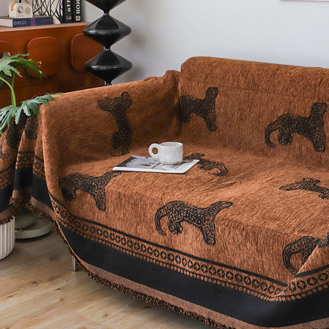 Brown leopard print two seater sofa cover made of polyester protecting a living room couch — view 5