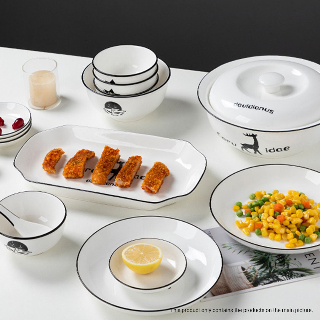 White antler ceramic dinnerware set with bowls, plates, spoons, and chopsticks on a dining table — view 5