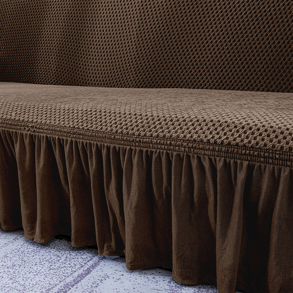 Coffee brown two-seater high stretch sofa cover with ruffled skirt protecting a living room couch — view 5