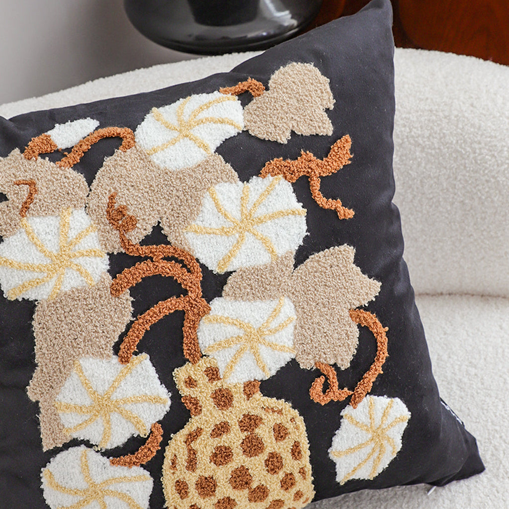 Floral embroidered throw pillow set in black and gold square design with wicker basket motif — view 5
