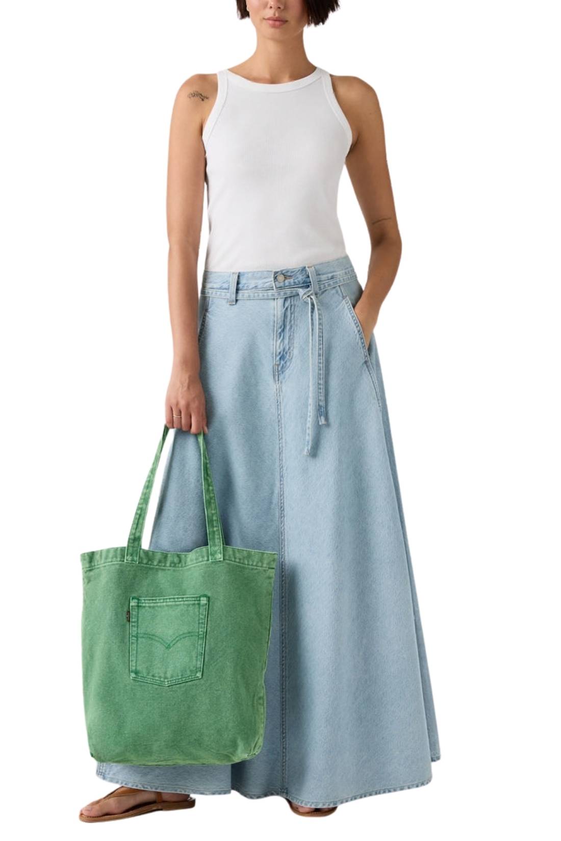 Beige denim tote bag with double handles, snap fastening, front pocket, and red signature label — view 12