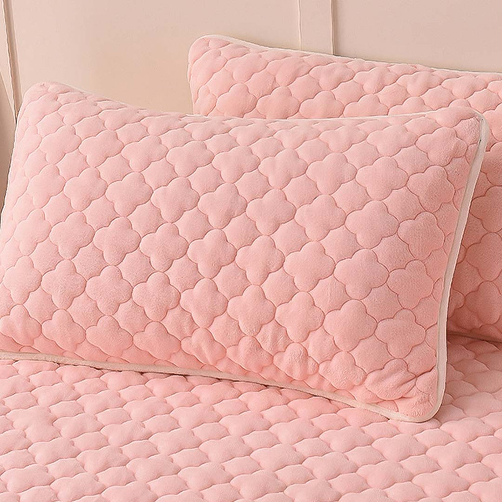 Pink quilted fleece stretchable mattress cover with clover design and two matching pillow covers — view 3
