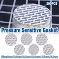 White pressure-sensitive foam bottle cap liners arranged in a neat pile for jar sealing