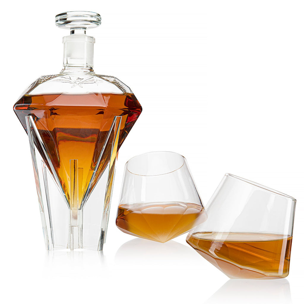 Diamond shaped glass whiskey decanter on a clear base with two matching diamond glasses. — view 5