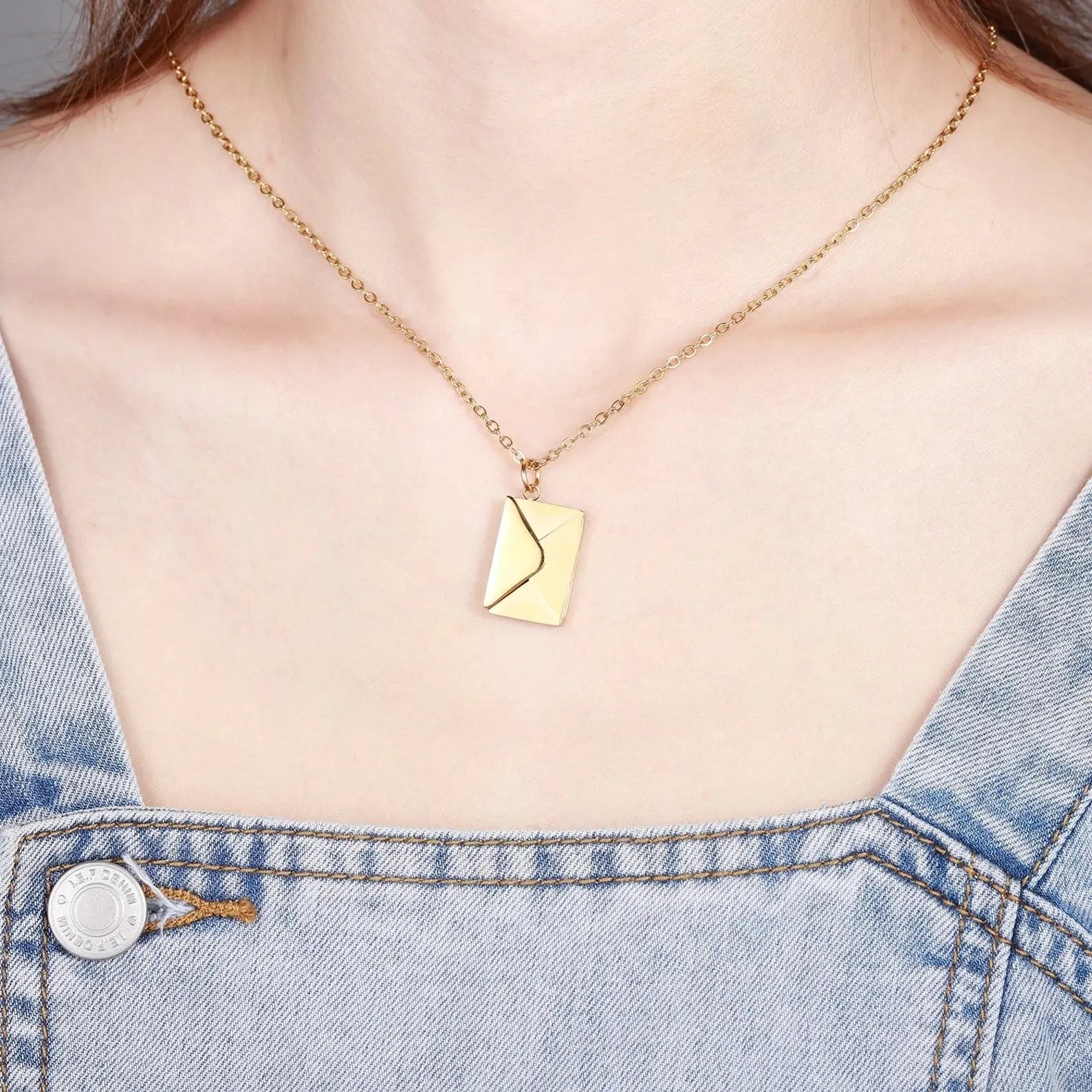 Personalized envelope necklace in gold displaying a hidden custom message pendant inside a box — view 3