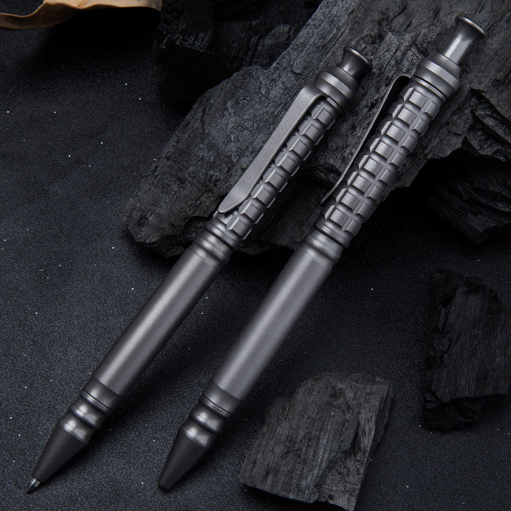 Compact titanium tactical pen with pocket clip and textured anti-slip grip for everyday carry
