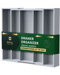 Gray bamboo 5-slot utensil drawer organizer holding silverware in a modern kitchen setting
