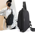 Large capacity water-resistant fanny pack in high-density nylon with four zipper pockets and adjustable crossbody strap