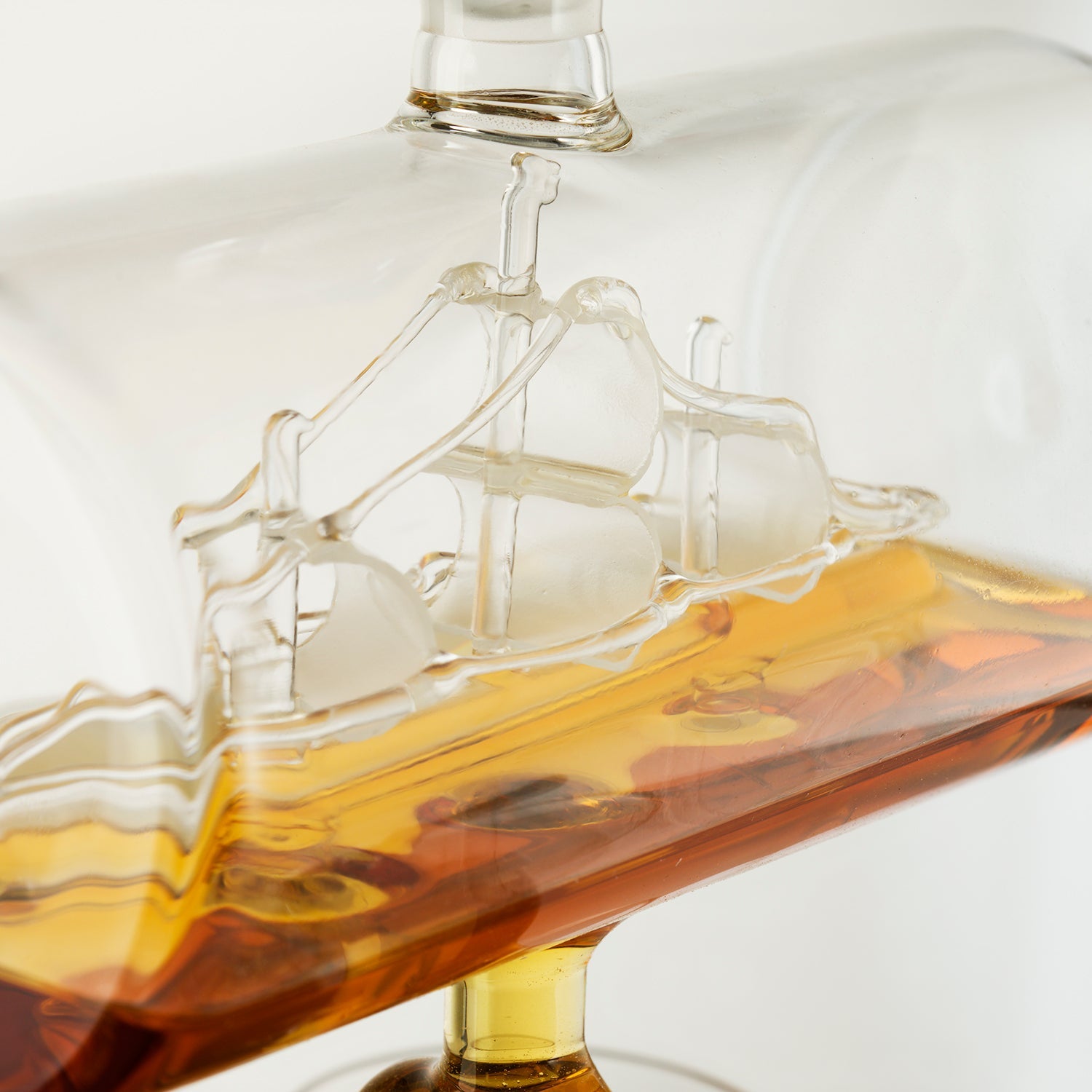 Hand-blown glass ship whiskey decanter with 1000ml capacity on a mahogany wood display base — view 5
