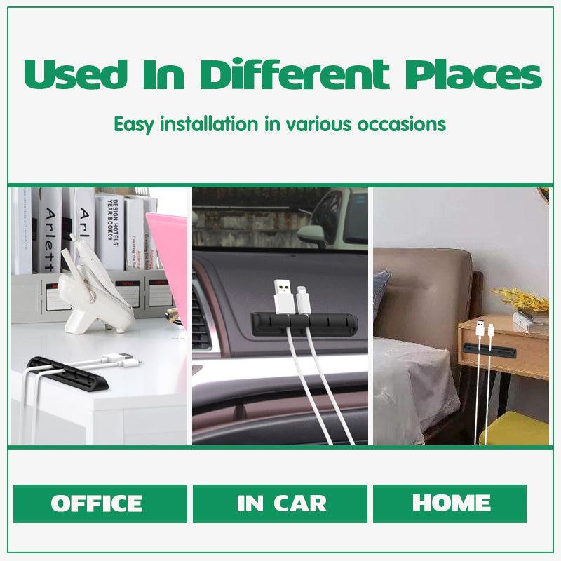Silicone desk cable organizer clips holding various USB and charging cords on a flat surface — view 3