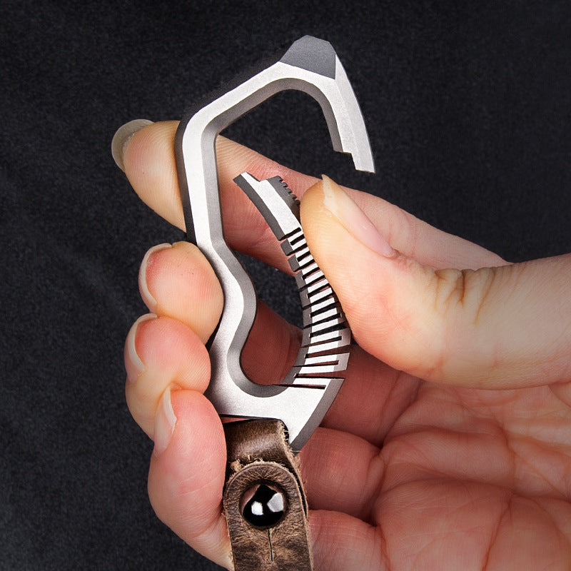 Titanium alloy keychain with genuine leather accents and sleek side-push locking mechanism — view 2