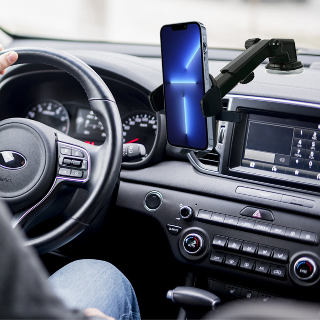 Adjustable long neck car phone mount with one touch release holding a smartphone on dashboard