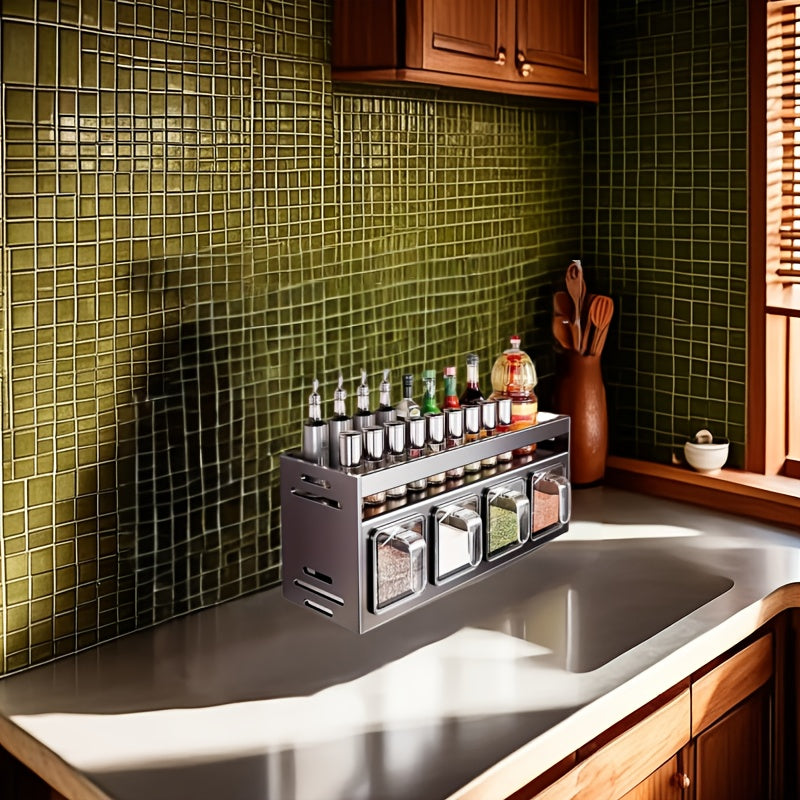 Wall-mounted aluminum spice rack in dark grey with clear storage jars on a kitchen wall — view 4