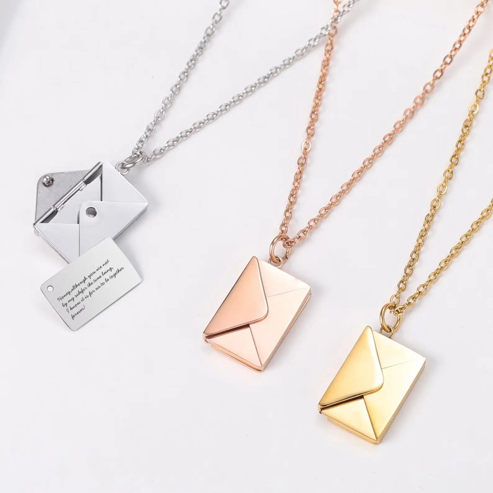 Personalized envelope necklace in gold displaying a hidden custom message pendant inside a box — view 4