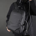 Classic black anti-theft men's business laptop backpack with multiple organizational pockets and secure compartments