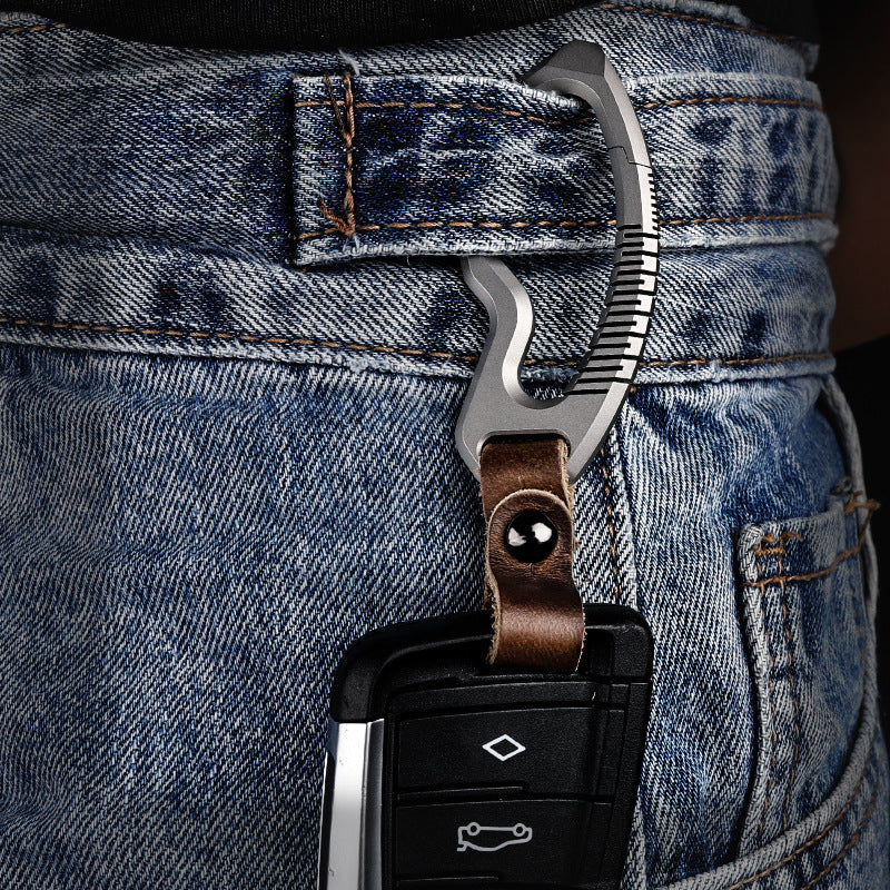 Titanium alloy keychain with genuine leather accents and sleek side-push locking mechanism — view 3
