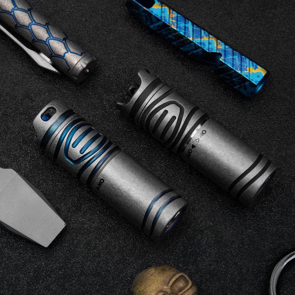 Titanium EDC flashlight, compact silver handheld LED torch for outdoor camping and everyday carry. — view 3