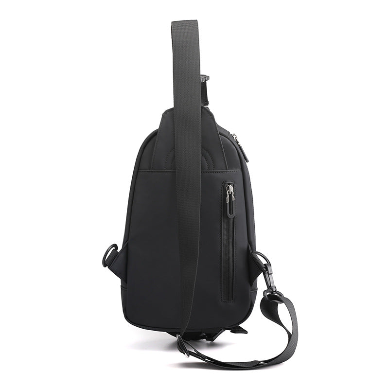Large capacity water-resistant fanny pack in high-density nylon with four zipper pockets and adjustable crossbody strap — view 4