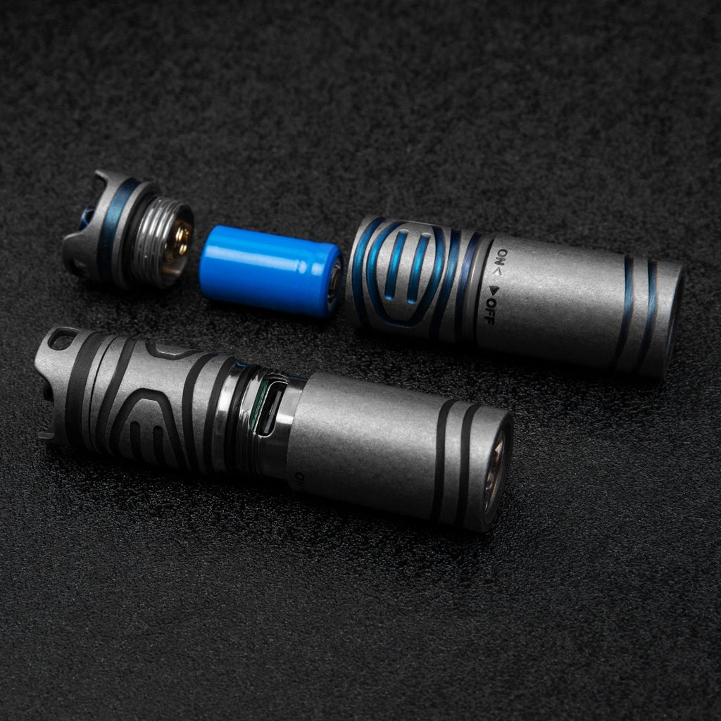 Titanium EDC flashlight, compact silver handheld LED torch for outdoor camping and everyday carry. — view 4
