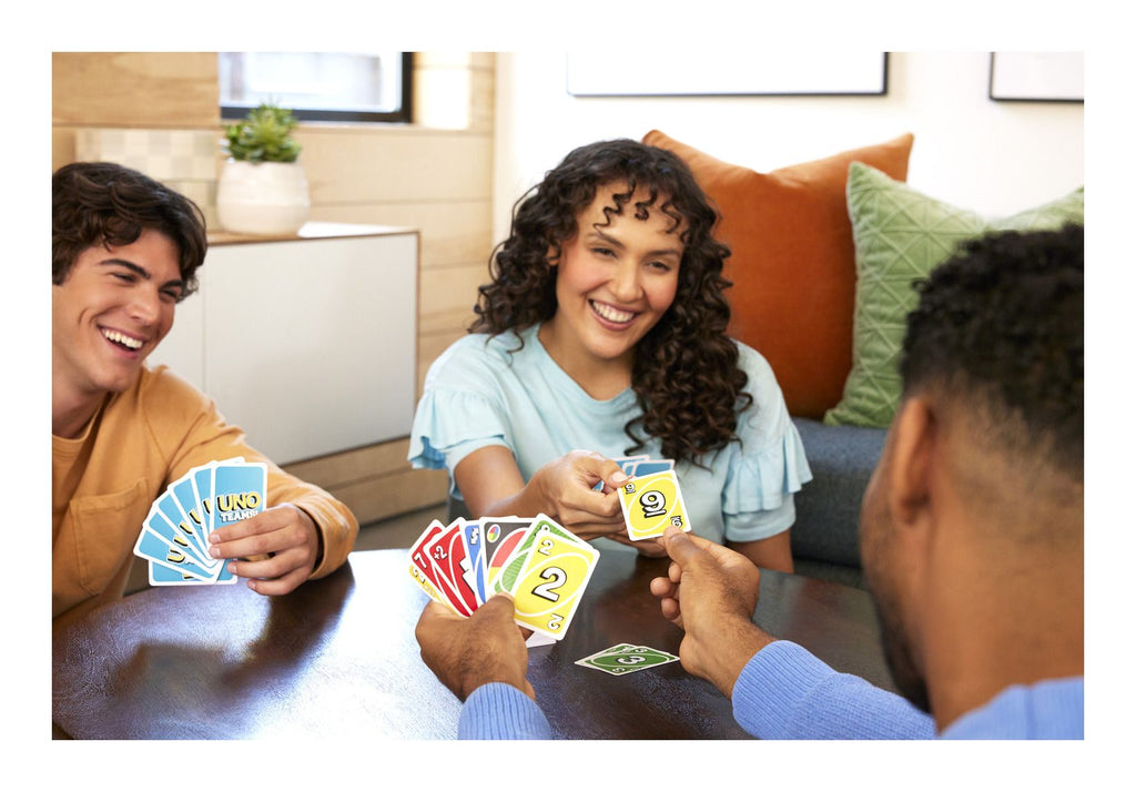 UNO Teams card game box and cards featuring vibrant colors and teamwork gameplay mechanics — view 3