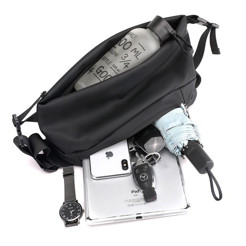 Large capacity water-resistant fanny pack in high-density nylon with four zipper pockets and adjustable crossbody strap — view 5