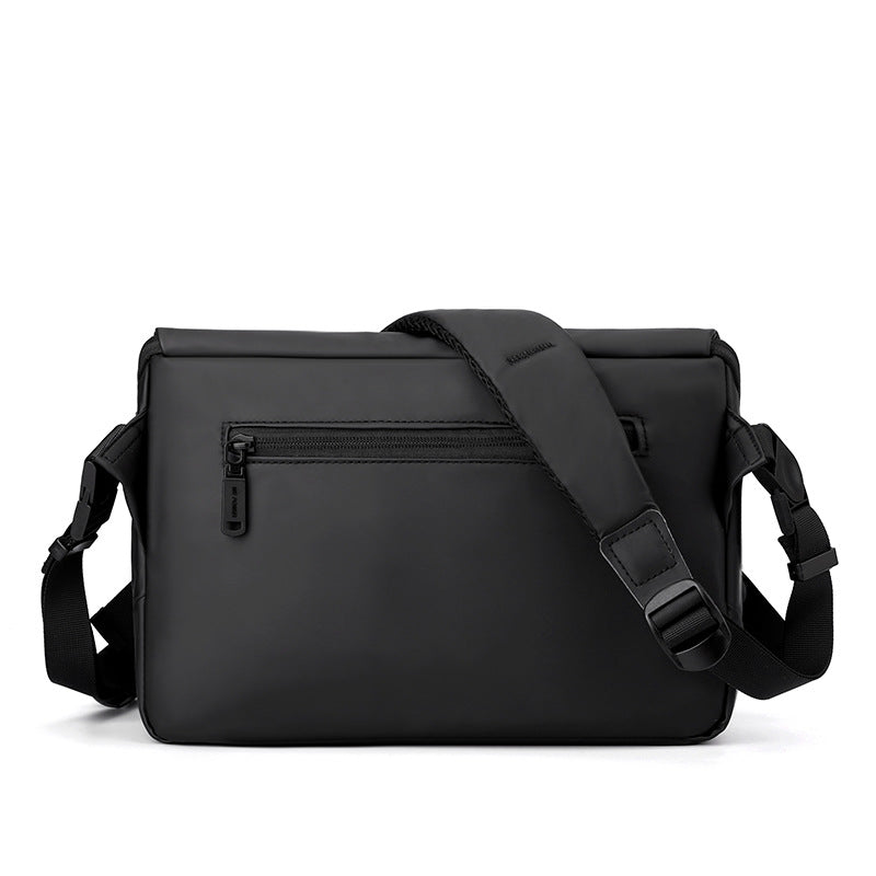 Black water-resistant minimalist men's messenger bag with adjustable shoulder strap and sleek flap design. — view 4