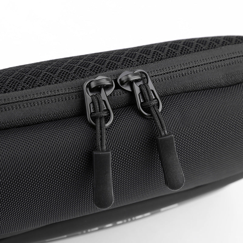 Sleek black fanny pack waist bag in durable nylon with multiple zippered compartments and adjustable strap — view 4