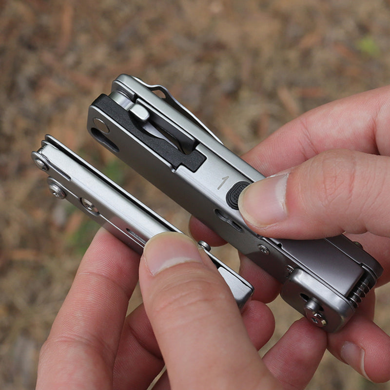 Stainless steel folding pocket multitool pliers with keychain attachment, featuring various extended functional tool blades — view 5