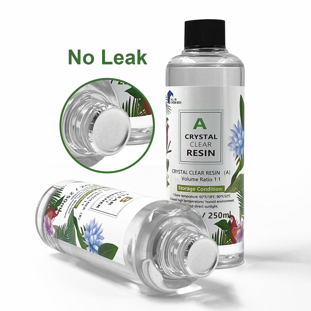 Crystal clear epoxy resin casting kit bottles with protective gloves and silicone craft molds — view 5