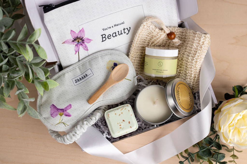 Luxury self care spa package box with scented candle shea butter shower steamer and eye mask