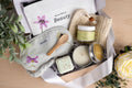 Luxury self care spa package box with scented candle shea butter shower steamer and eye mask