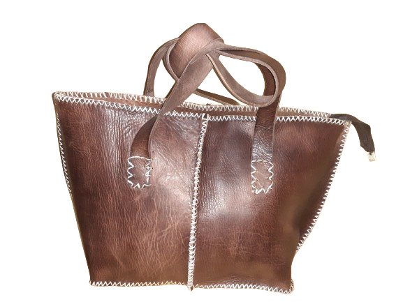 Medium rectangular rustic cowhide leather handbag with white stitching and sturdy dual handles. — view 7