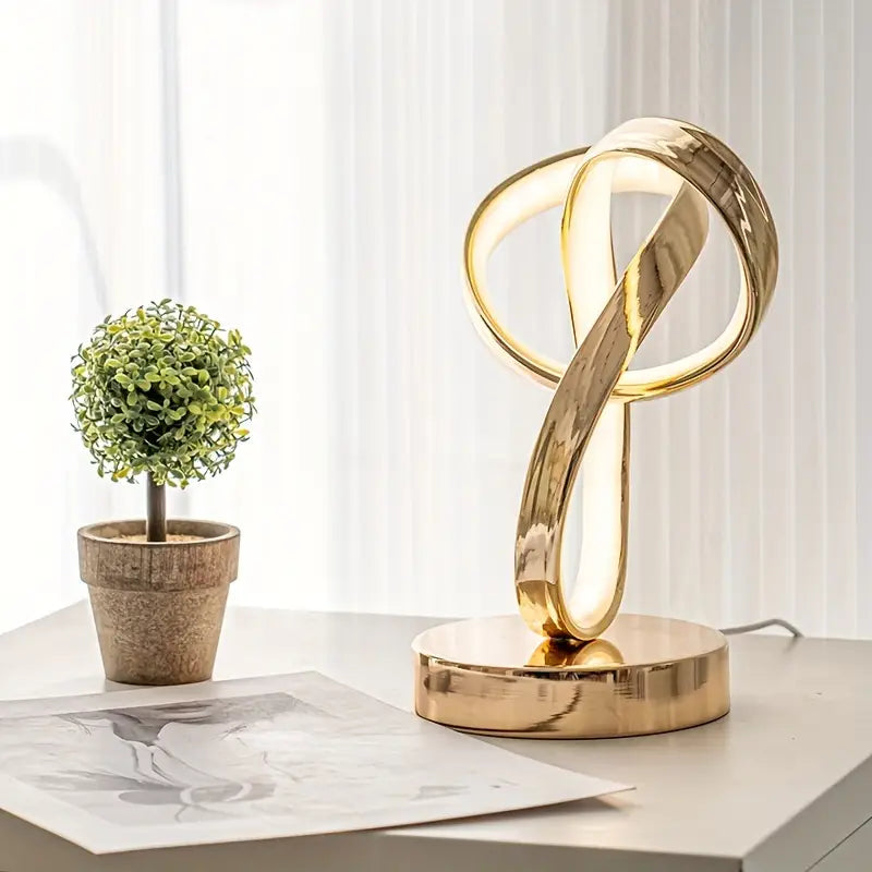 Golden space-themed USB bedside table lamp with polished metal base and soft glowing shade — view 3