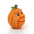 Hand-painted Halloween pumpkin resin figurine with expressive monster face for outdoor garden and tabletop decor