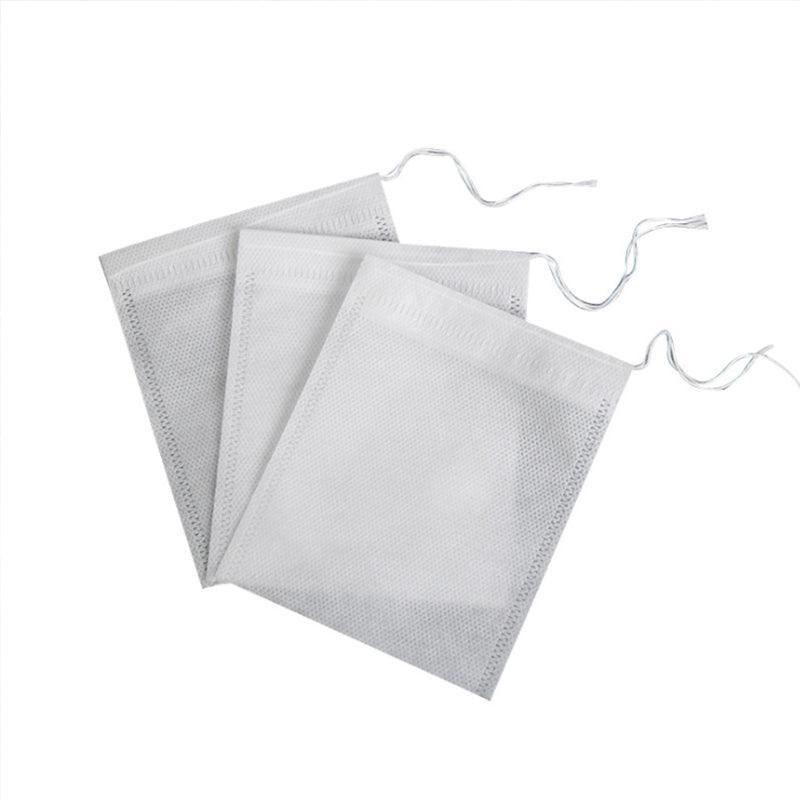 Set of 50 beige cotton muslin drawstring filter bags for tea, spices, and soup preparation. — view 2