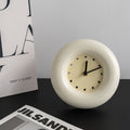 Modern round iron desk clock with matte finish perfect for silent minimalist home office decor