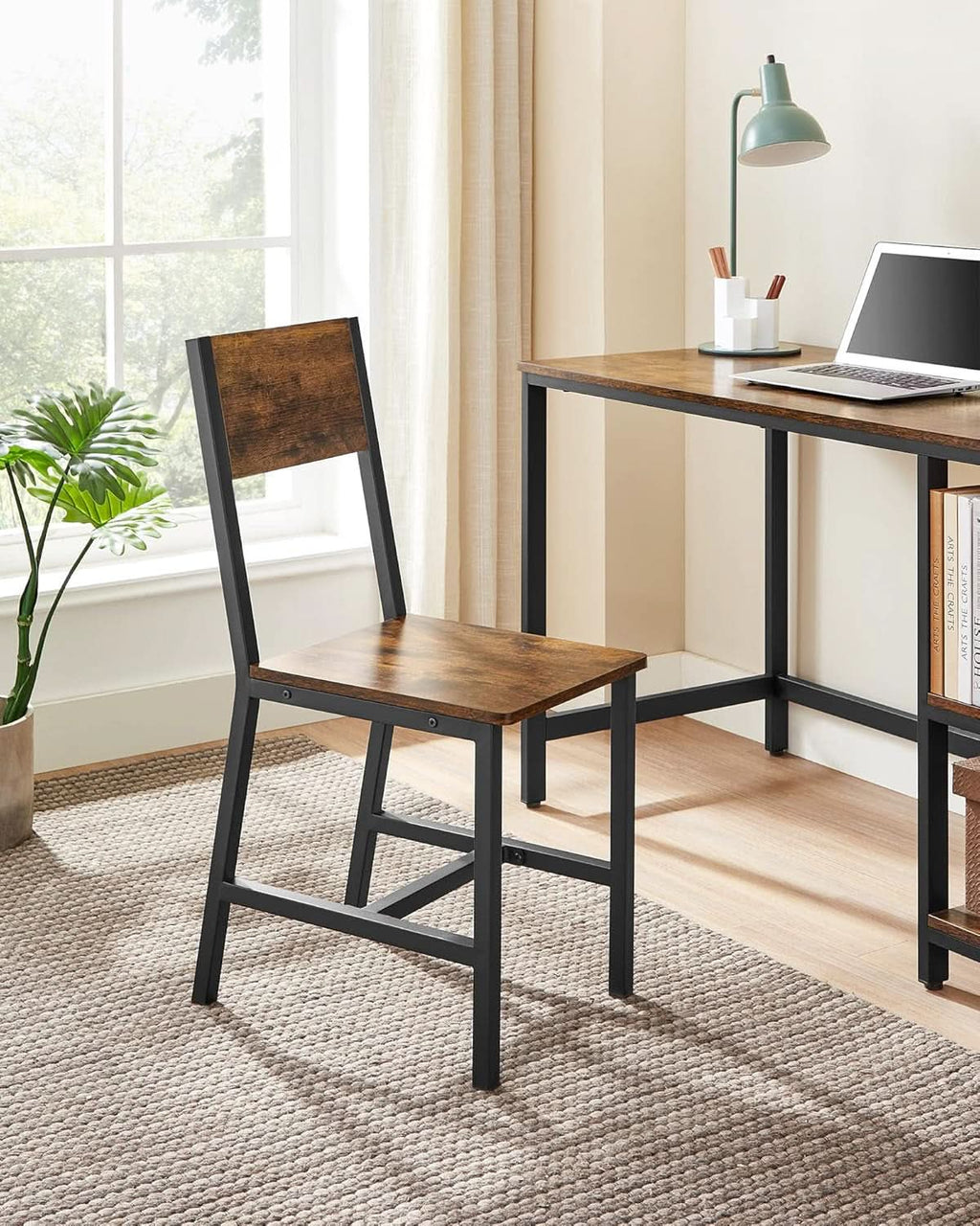 Four rustic brown wooden dining chairs with black industrial metal frames and ergonomic angled backrests — view 4