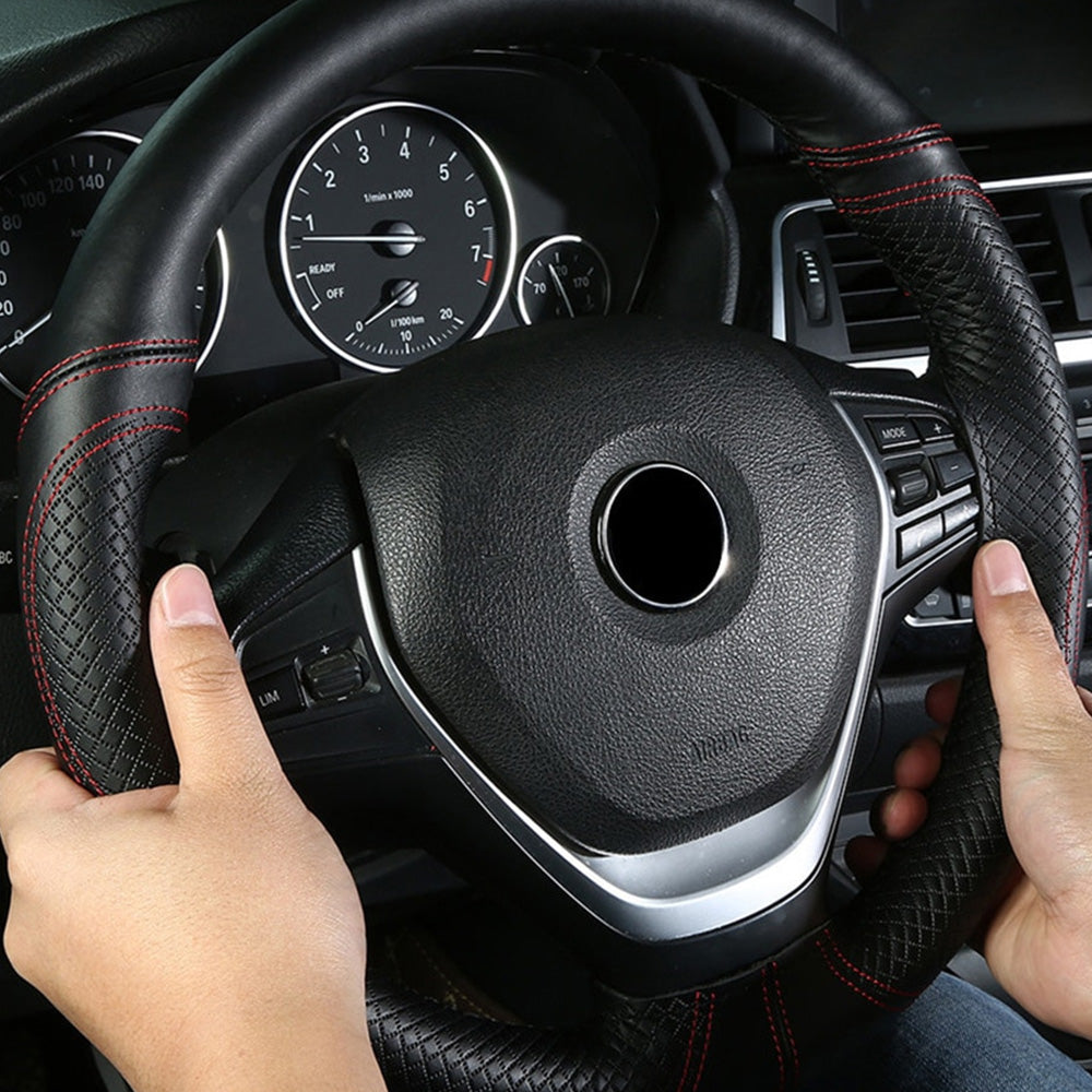 Premium black leather steering wheel cover with red stitching and DIY sewing needles — view 3