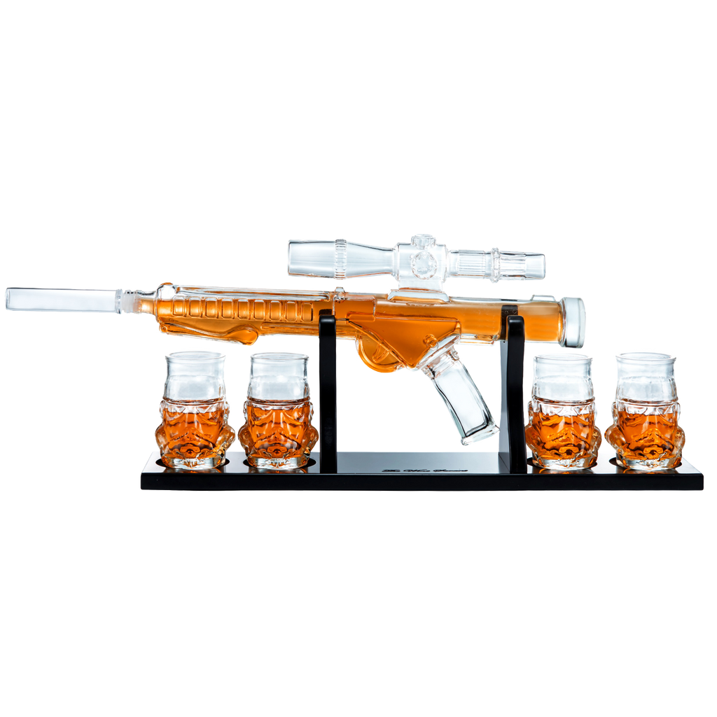 Glass blaster force gun whiskey decanter set with four glasses on a mahogany wood display base