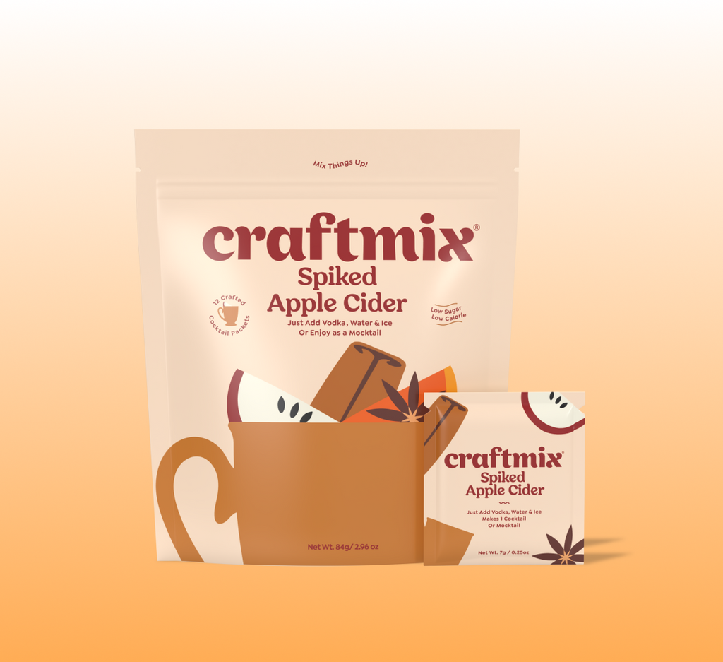 Craftmix spiked apple cider cocktail mix packets with fresh apples and warm autumn spices.