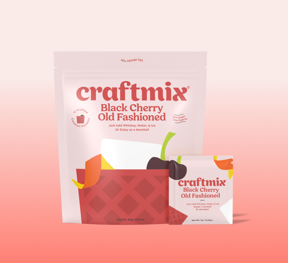 Black cherry old fashioned cocktail mix packet with a dark red drink over ice