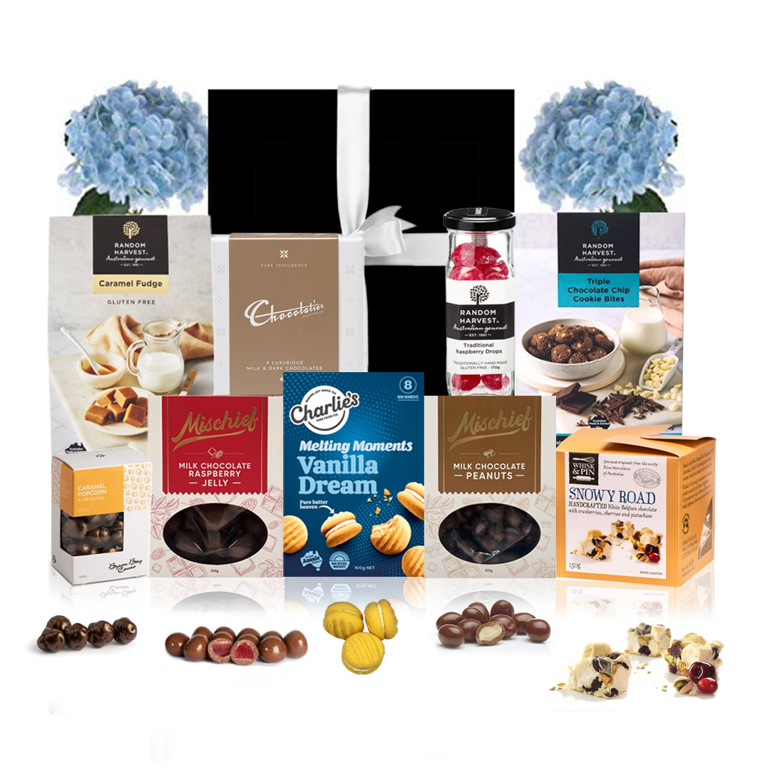 Gourmet Australian snack gift hamper in an elegant black box with a pristine white bow