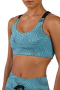 Light blue patterned nylon women's running sports bra with adjustable straps and rowing style back